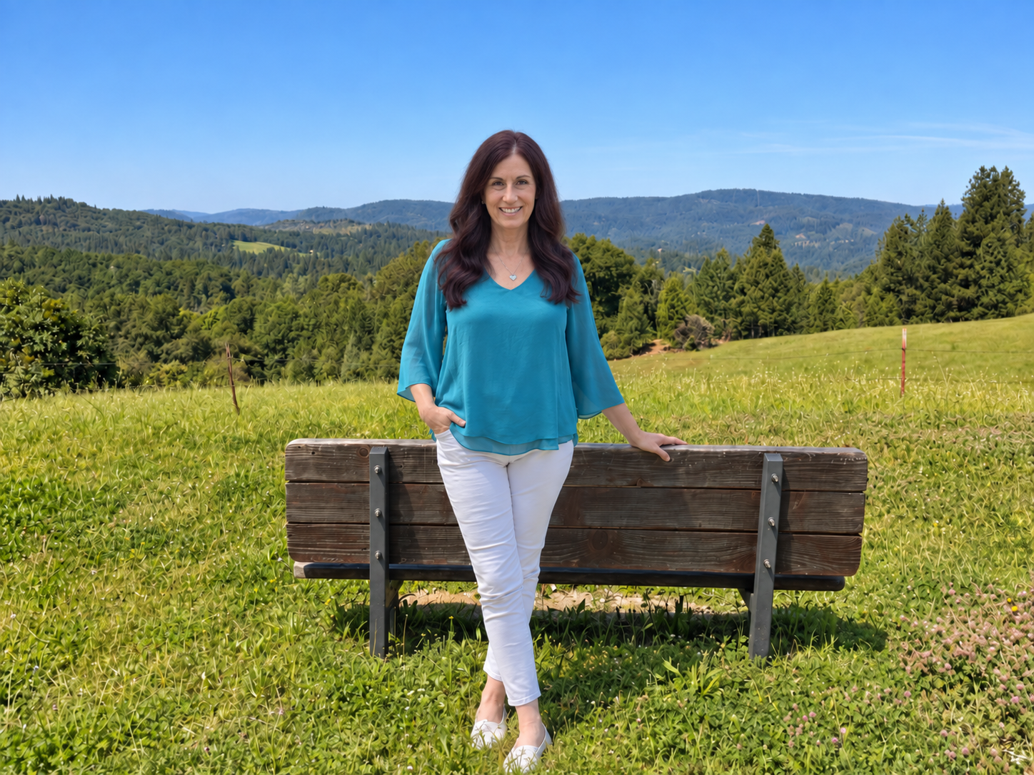 Kate Steele, founder of Lotus Inspirations, in a mountain meadow